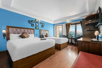 Triple Room with Balcony — Tiger Sapa hotel